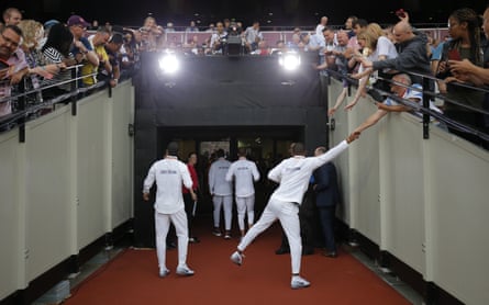 Great Britain’s men’s 4x100m relay team leave the stadium after receiving their gold medals.