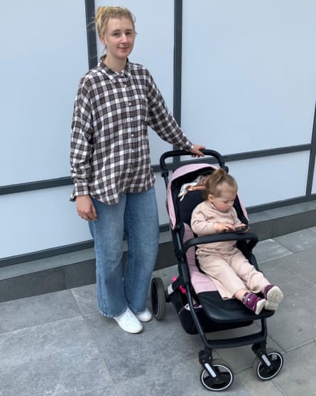 Woman with young child in stroller