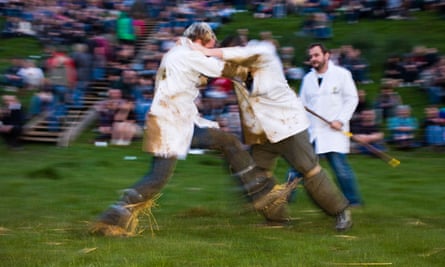 Two men shin kicking at the Cotswold Olimpicks, Gloucestershire.