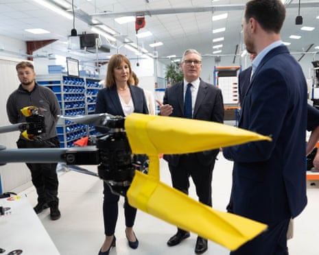 Prime Minister Keir Starmer and Chancellor Rachel Reeves stand in an aeronautics factory