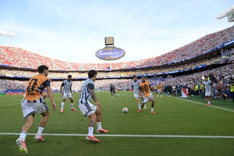 The Argentina players take part in the warm-up ahead of kick-off.