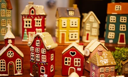 Miniature porcelain houses arranged on a table