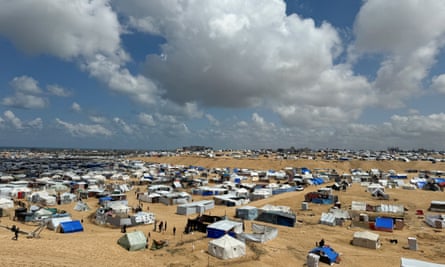 Displaced Palestinians during Eid al-Fitr at a tent camp in Rafah.