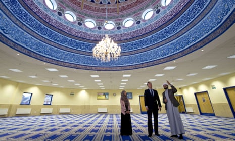 David Cameron talks with Imam Qari Asim (righ), and Shabana Muneer, a member of Makkah Masjid mosque’s women’s group, as he visits Makkah Masjid Mosque in Leeds