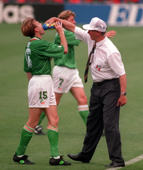 The Ireland manager Jack Charlton gives some water to Tommy Coyne at the Fifa World Cup in 1994.