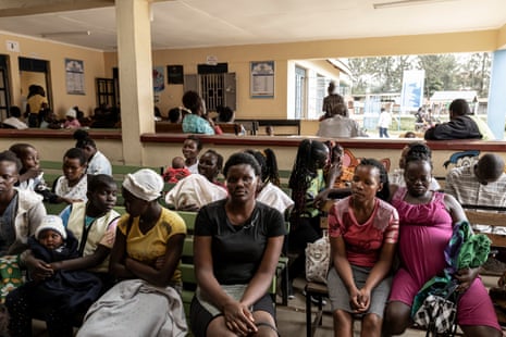 Mothers with children waiting at Kuoyo Sub-county hospital in Kisumu, Kenya.