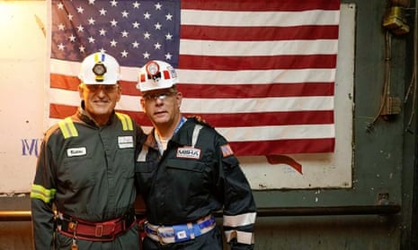 Joe Manchin (left) poses with Labor Secretary Marty Walsh in August, during a tour of a coal mine in Dallas, West Virginia.