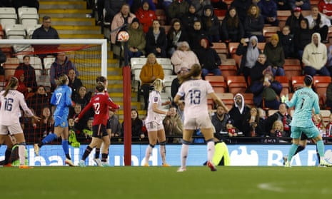 Arsenal keeper Manuela Zinsberger (right) has a shot on goal during the FA Women’s Super League football match between Manchester United and Arsenal.