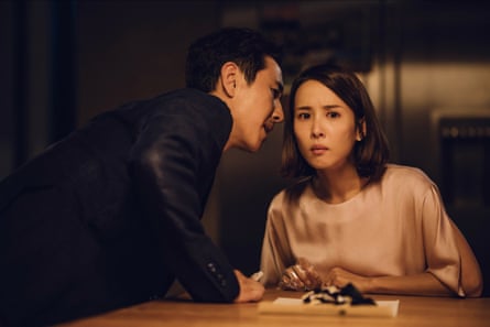 Lee Sun-kyun as Park Dong-ik and Jo Yeo-jeong as Park Yeon-kyo in Parasite