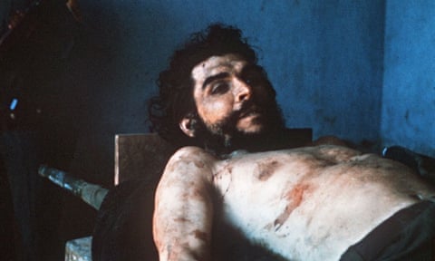 In a picture taken on 10 October 1967 by AFP journalist Marc Hutten of the body of Argentina-born guerrilla leader Ernesto ‘Che’ Guevara is exposed on a laundry sink in the village of Valle Grande, Bolivia.
