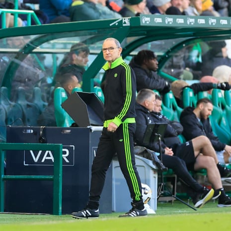 martin o'neill in banging black and birght green tracky