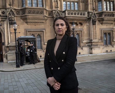 Woman stands outside the House of Lords