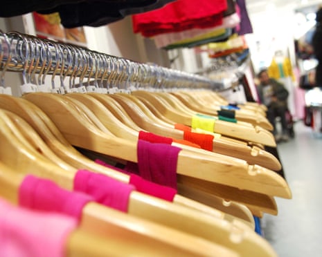 Clothes hanging up in an American Apparel shop in Curtain Road, London