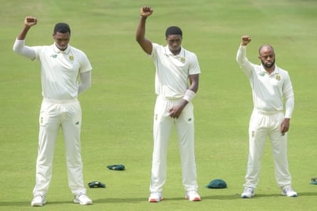 South Africa’s Lungi Ngidi, Lutho Sipamla and Temba Bavuma show their solidarity with the Black Lives Matter movement on the first day of the first Test in Sri Lanka in 2020.