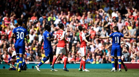 Koscielny, shown a red card by referee Michael Oliver.
