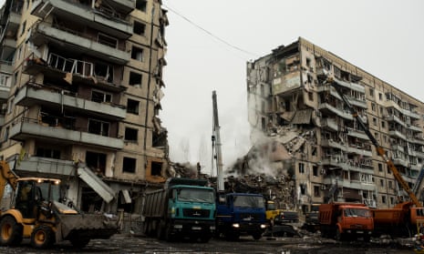 Scene of destruction at high-rise residential building hit by Russian missile strike in Dnipro.