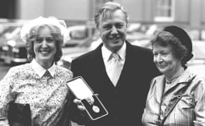 Sir David Attenborough who was knighted by the Queen at an investiture at Buckingham Palace, London, with his wife Jane (right) and daughter Susan.