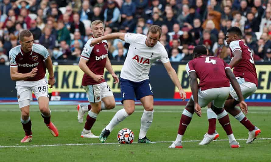 Tottenham’s Harry Kane struggles to find a way through West Ham’s defence.
