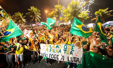 Supporters Jair Bolsonaro celebrate in Rio de Janeiro after he won Brazil’s presidential election on 28 October.