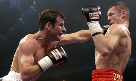 Joe Calzaghe of Wales lands his left glove on Mario Veit of Germany and goes on to win the WBO Super Middleweight world title fight in Braunschweig 07 May 2005. 