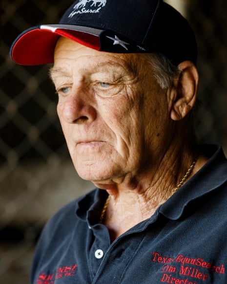 A man wearing an EquuSearch polo and a cap