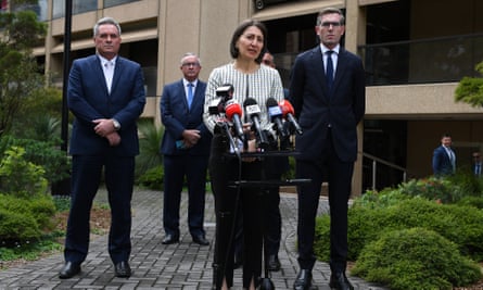 Then-NSW premier Gladys Berejiklian (centre), with Stephen Cartwright (at left), Brad Hazzard and then-treasurer Dominic Perrottet (right) in 2020.