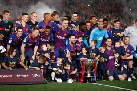Barcelona players celebrate their title win.