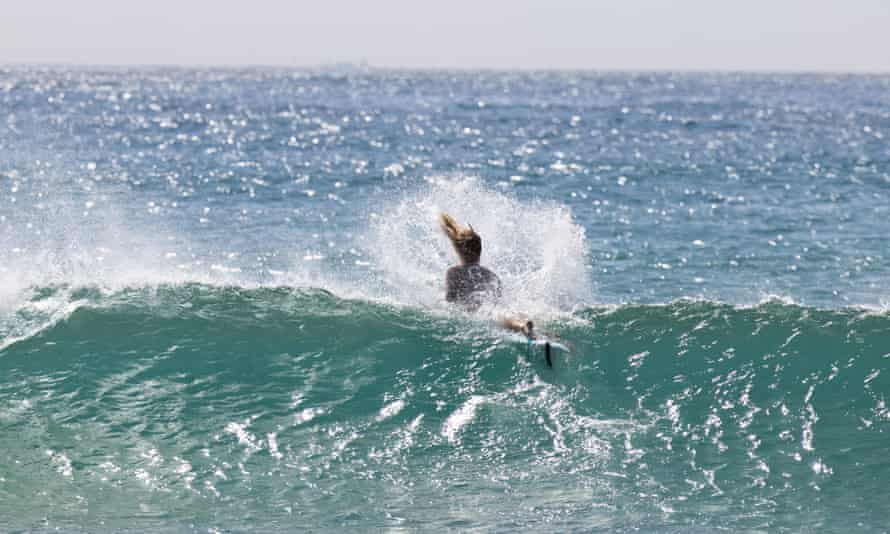 Sarah Doyle, catching a wave.