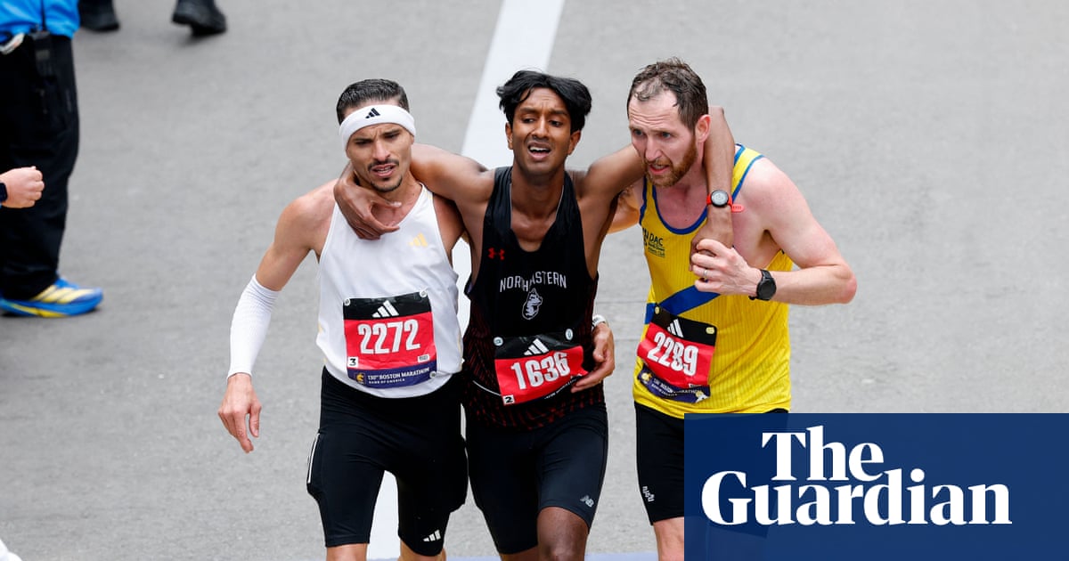 Two are stronger than one': Boston Marathon duo praised for helping struggling runner cross finish line