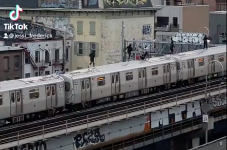 A video posted to TikTok shows a group of people dashing across the roof of a moving New York City train.