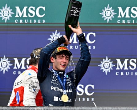 The Formula One driver Kimi Antonelli pours champagne over himself while on the podium after winning the United States Grand Prix at the Circuit of the Americas in Austin, Texas.