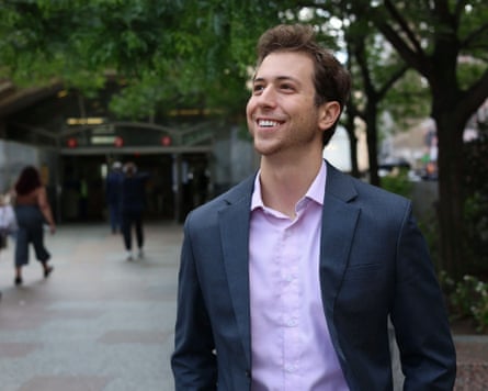 A young man smiles