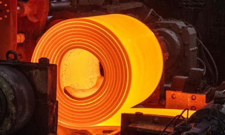 A roll of coiled steel leaves the coil box on the steel production line at the Tata Steel plant in Port Talbot, Wales.