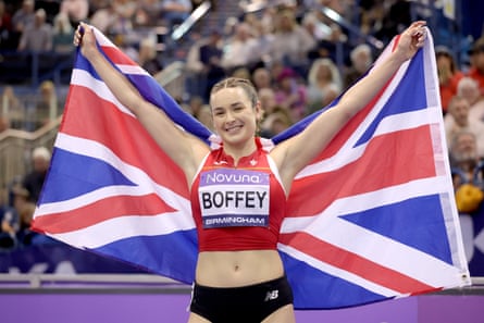 Issy Boffey in a Great Britain flag at the UK Indoor Championships.