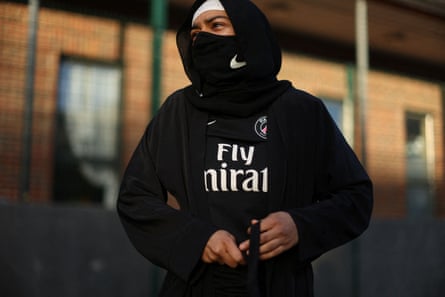 Atiya, 24, adjusts her robe during a Sisterhood FC training session at Dockland Settlements Community Centre