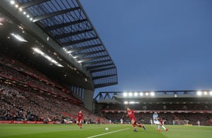 Virgil Van Dijk clears the ball during the Liverpool v Huddersfield Premier League match at Anfield in April 2019.