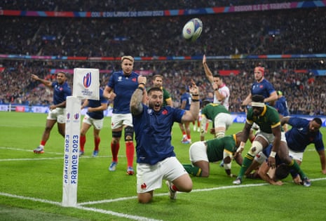 Cyril Baille of France celebrates scoring his team's first try.