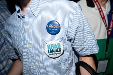 close up of campaign buttons that read ‘Lander for Mayor’ and ‘Brad Lander for Congress’