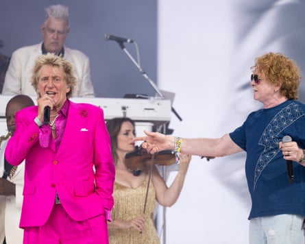Mick Hucknall joins Stewart on the Pyramid stage at Glastonbury festival.