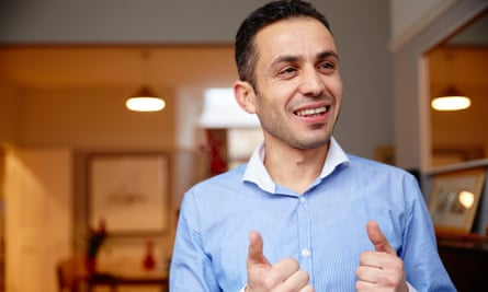 MANCHESTER, 17th December 2015 - Guardian writer Helen Pidd at home in Manchester with her Syrian lodger, Yasser. (Credit: Christopher Thomond, The Guardian)