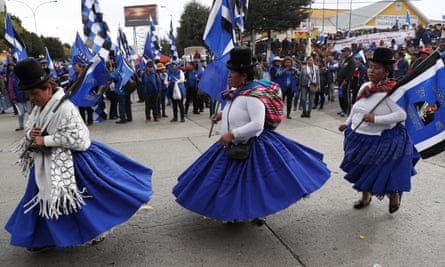 Supporters of President Evo Morales perform at a closing campaign rally in El Alto, on the outskirts of La Paz, Bolivia, Wednesday.