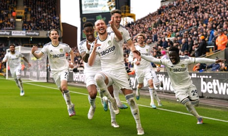 Leeds United's Luke Ayling (centre) celebrates scoring their side's second goal of the game with team-mates.