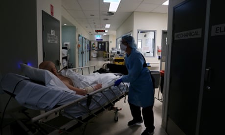 patient wheeled into ward