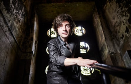 Danny Robins looking spooky in a spooky church