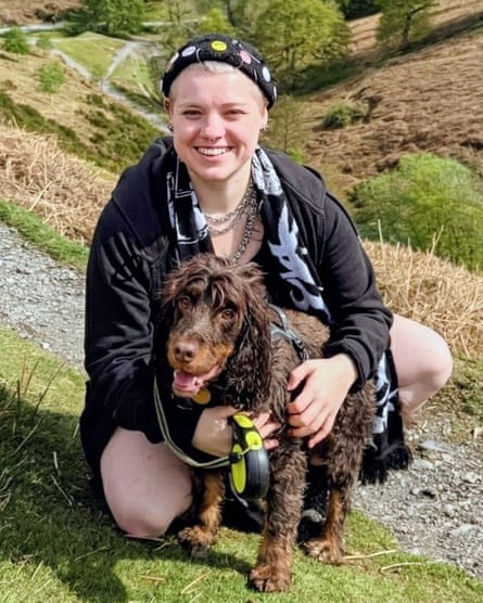 Tayla Hopkins with dog in countryside