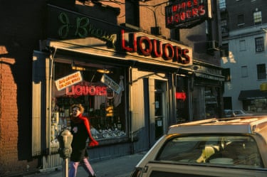 Manhattan, exterior of a liquor store, 1985, seen in dramatic evening shadows