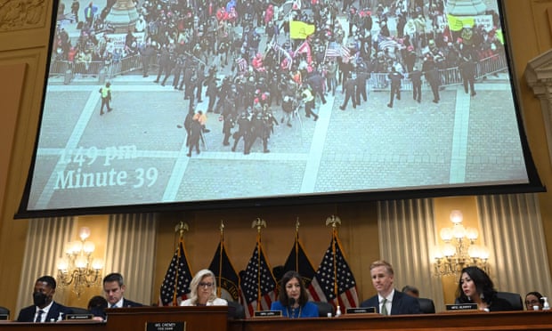 Video from the 6 January events at the US Capitol last year, is displayed at a House select committee hearing on 21 July.