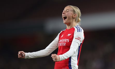 Chloe Kelly of Arsenal Women celebrates a goal in the Champions League