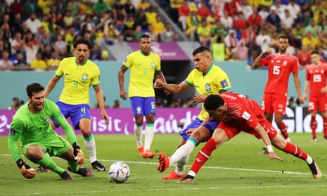 Ruben Vargas of Switzerland (R) in action against Thiago Silva (2-R) and goalkeeper Alisson of Brazil.