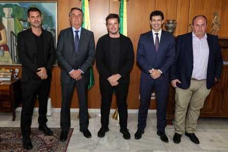 And that’s me with the homophobic, climate-crisis denying president … Bjarke Ingels, centre, meets Brazil’s Jair Bolsonaro, second left.